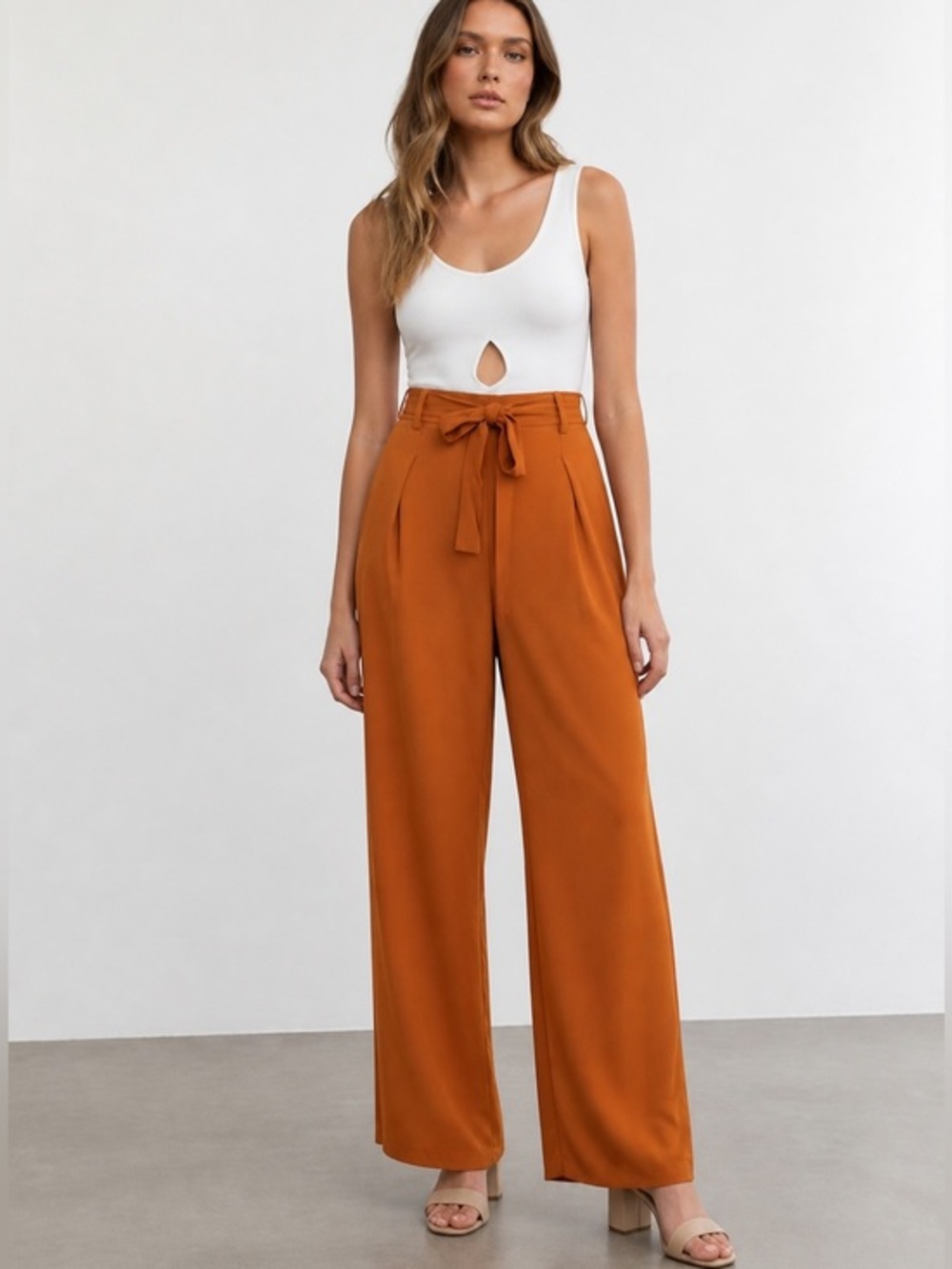 Wide leg Slack Pants . Light weight with tie belt .